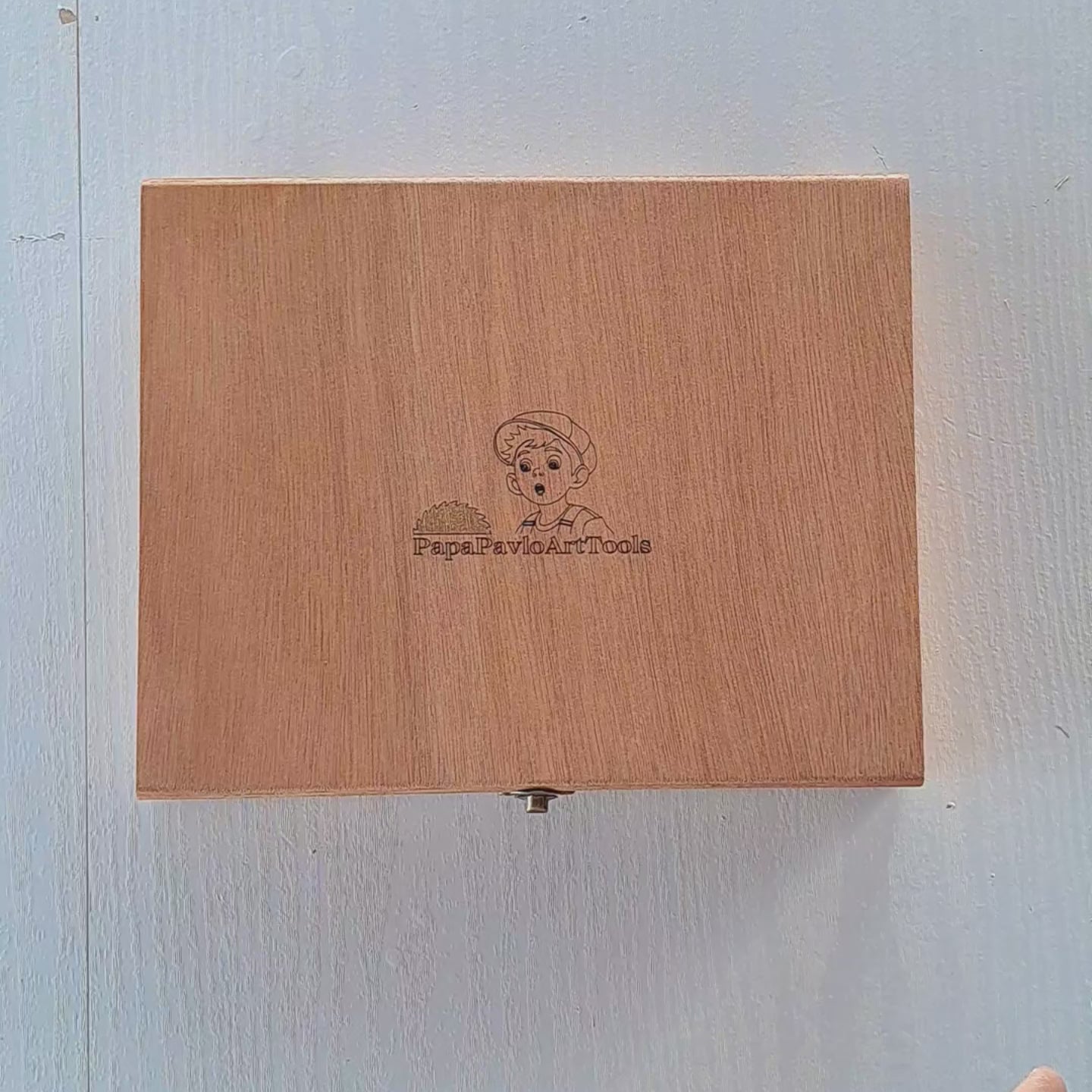 Studio oil painting palette with mixed colors preserved by freezing